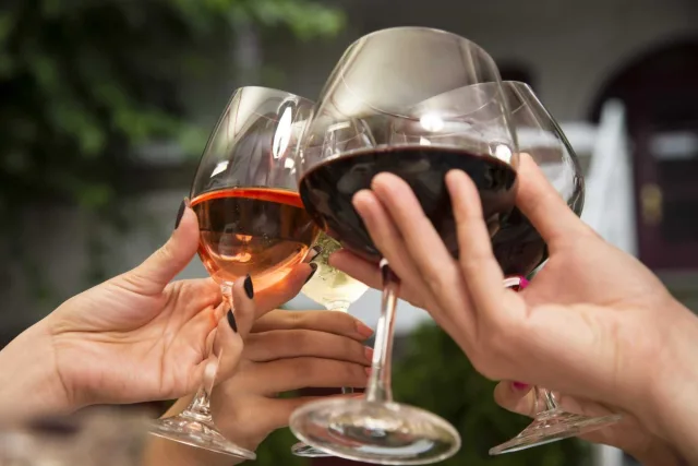 Toasting with wine 000068568279 Large