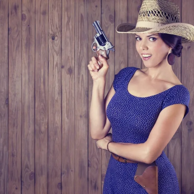 Cheerful cowboy girl 000070653859 Large jpg